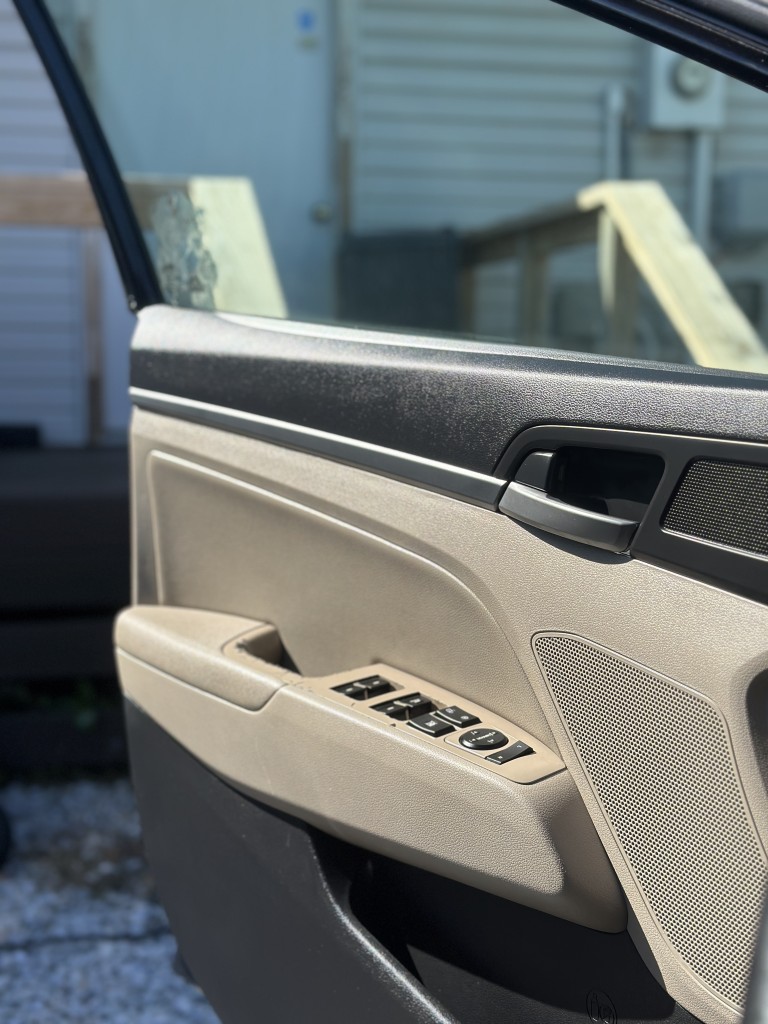 Detailing work on protected vehicle trim